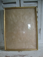 fotolijst met bol glas goudkleurig