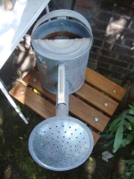 zinken gieter met sproeikop