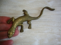 Hagedis van koper of messing