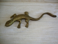 Hagedis van koper of messing