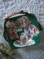 Japans schaaltje met rieten handvat