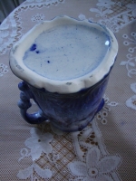 antieke melkkan kobaltblauwe bloemen