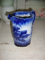 antieke melkkan kobaltblauwe bloemen
