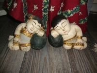 oude houten beelden gelukskinderen