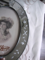 ovaal fotolijstje met spiegelrand