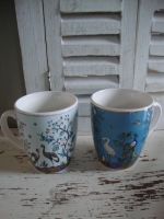 Twee porselein mokken met vogels Siaki