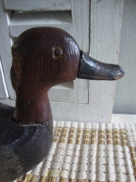 antieke eendenkooi houten eend