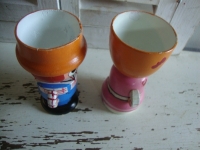 vintage houten eierdoppen broer en zus